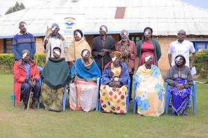 Ugandan refugees pose for picture after sight is returned with cataract surgery