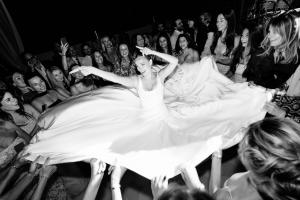 Guests celebrate the bride during a luxury European destination wedding by Soirées CaféDelux Events, highlighted by Ageless Living Manhattan Magazine for its refined international event planning.