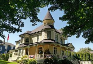 Front Exterior View of the 1889 Victorian House After Roof Replacement