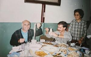 International trainees celebrating a birthday with traditional Chinese longevity noodles