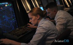 AviatorDB Image of Two Air Traffic Controllers looking concerned at what they see on radar