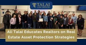 Ali Talai poses among real estate professionals attending his real estate asset protection seminar for California real estate investors.