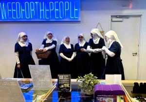 a group of sisters inside a Catalyst dispensary
