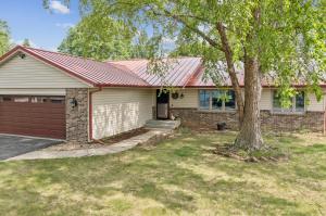 View Of The Front Of A Beautiful Metal Roof Installed by Honeybee Roofing