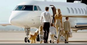 Family boarding a luxury private jet as part of the LIME Yacht Brokerage private aviation program, providing seamless travel and lifestyle benefits for superyacht owners.