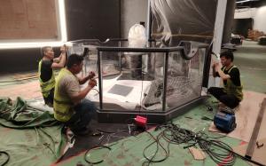 Zoomking technicians installing interactive science museum exhibit on client site, showcasing end-to-end engineering and installation services.