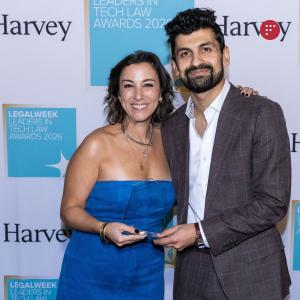 Nicole Bradick and Shabeeb Yusuf of Factor pose with the Best Tech Training Program award at the Legalweek Leaders in Tech Law Awards 2026.