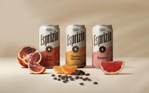 Three cans of Esprizio sparkling espresso spritz in three flavors