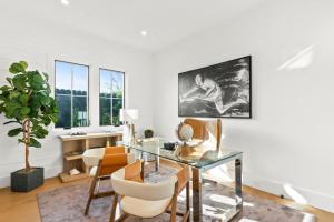 A view of boats in the harbor from the balcony of a luxury waterfront condo in Marina del Rey, CA.