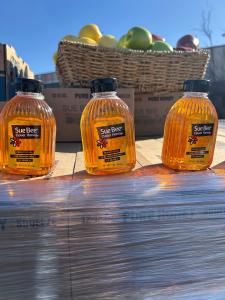 Close-up of Sue Bee® 12-ounce bottles of honey.