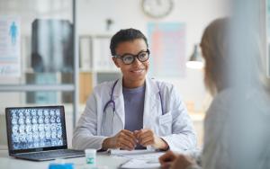 Woman talking with doctor about fibroids