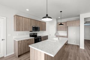 Professionally designed kitchen with greloch cabinets and island.