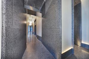 terrazzo walls, ceilings, and floor in luxury residential highrise lobby