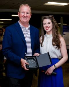 Mayor Jeff Cheney receives a Real Estate Forum Honoring Visionary Leadership Award at a REF Connect event in Frisco, Texas, recognizing leadership in real estate development and city growth.