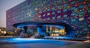 An exterior night shot of the Stella Nova Resort at Universal Orlando. Photo Credit: Matt Goode