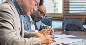 Billionaire Eric Aedan Fitzgerald the 5th signs an  agreement with Chairman Moon in South Korea.