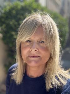 iza Evans, Founder, International Feng Shui Day blonde woman wearing navy top