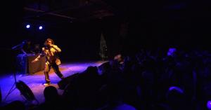 Ashwin Gane performing on stage with DJ behind him at Lowbrow Palace El Paso concert.