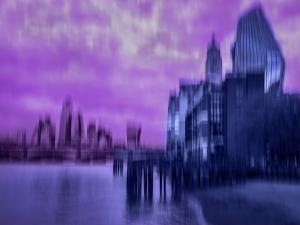 Duotone abstract urban ICM photograph in blue and violet tones with blurred skyline motion and atmospheric architectural rhythm.