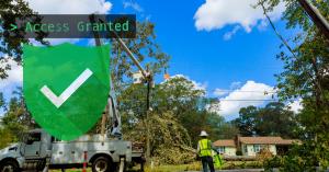 Construction crew using a mobile device on-site to manage 811 locate tickets, representing the BOSS811 Dig™ early access utility ticket management software.