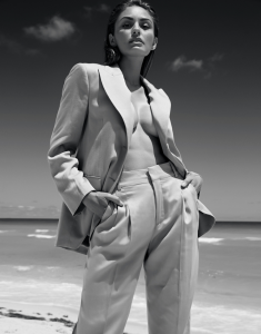 Karen Lima, international model and content creator, photographed in Miami wearing a neutral-toned outfit, representing her evolving career and focus on modern motherhood.