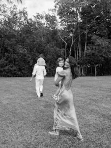 Karen Lima with her family in Miami, reflecting her focus on modern motherhood, identity, and personal development.