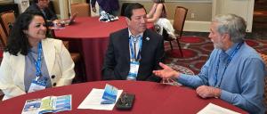  Pronita Saxena, Reggie Wassana, and Kevin Wolf having a conversation about tribal sovereignty