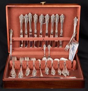 57-piece Wallace Grand Baroque sterling flatware set weighing 63.3 troy ounces, in a felt-lined wooden case ($4,551)