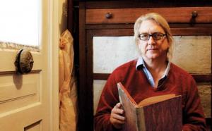 Tom Irwin holding the diary that drives Sangamon Songs