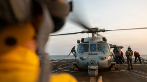 A MH-60S Sea Hawk helicopter prepares to take off from the USS Spruance during Operation Epic Fury. Navy photo.