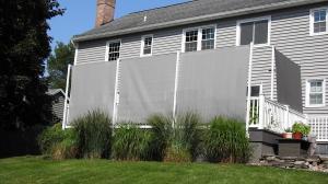 ShadeFit Kit freestanding structural shade system installed on a residential deck to block low-angle sun glare.