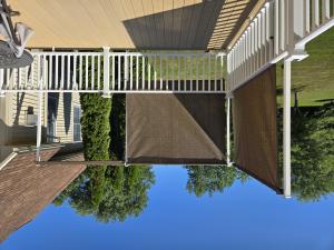 ShadeFit Kit freestanding structural shade system installed on a residential deck outside corner to block low-angle sun glare.