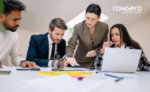 Business team collaborating on CRM implementation and digital transformation in a corporate office