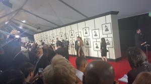 artists lineup on the Grammy red carpet step and repeat.