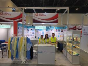 Kinmed exhibition booth at Arab Health 2026 displaying surgical gowns, PPE, and medical consumables at Dubai World Trade Centre