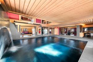 Resort-Style Living with Indoor Pool, Saunas and Private Spa