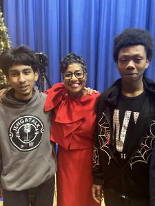 Two Jegna Klub members standing with Mayor Christal E. Watson.