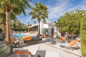Palm Springs vacation rental property with pool and palm trees managed by Navigate Stays short-term rental management Southern California