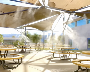 Photo of Children's Museum of the Desert Outdoor Lunch and Activities Space with a view of the misters in action!