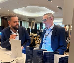 Amjad Jaber signs copies and connects with attendees at P3C 2026 in Dallas, Texas.