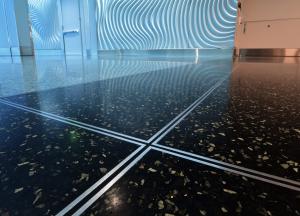 Close up of terrazzo, aggregates, and double divider strips