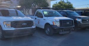 20 Open Sesame Garage Door Repair service trucks lined up for dispatch in Summerlin NV.