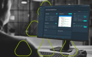Computer screen displaying the Fundamentum IoT platform dashboard with device data and configuration panels.