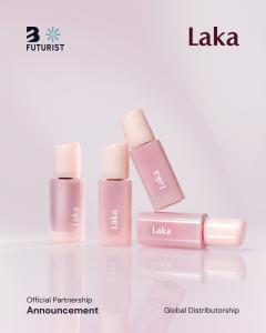 Four Laka Bonding Glow Lipsticks in translucent pink packaging arranged on a reflective lavender surface for the B Futurist global distributorship announcement.