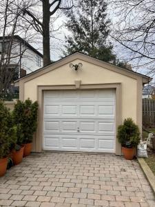 Stucco of the garage also repaired and painted