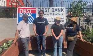 Samson Mulugeta, Director of Employment Services at ECF pictured with First Bank volunteers at the Exceptional Children's Foundation in Inglewood for the "Future in Bloom" project
