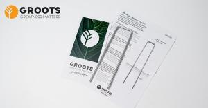 Groots galvanized ground cover peg with branded gardening card and instruction sheet on white background