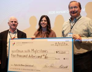 Lisa Hill accepts the Inspire the Human Spirit Award for Down with Mylestones