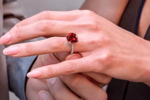 Girl wearing ruby engagement ring