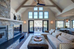 A beautifully designed and built great room with exposed beams and a view overlooking Lake Sonoma; designed and built by the team at LEFF Construction Design Build, Sebastopol, CA